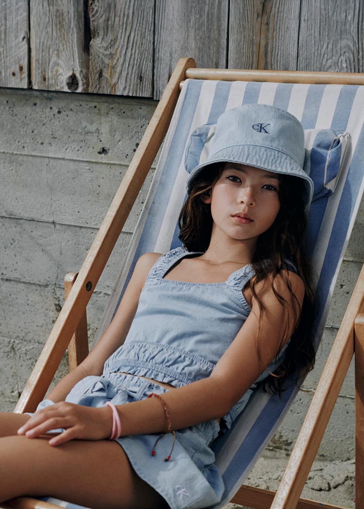 Girl posing on a beach chair